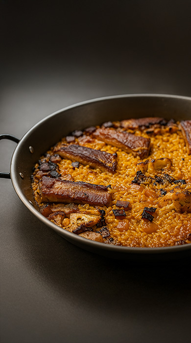 Arroz seco de costillas con coliflor y calabaza