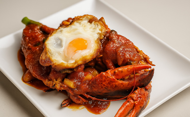 receta de bogavante con tomate frito y huevo crujiente